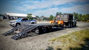 Hi rail trailer with road and rail wheels ready for rail maintenance work